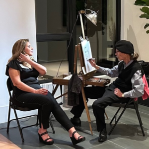 Dan Ginter, caricature artist, in action