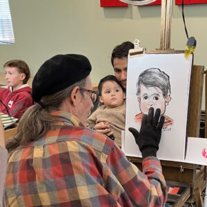 Our team sketching at a family event